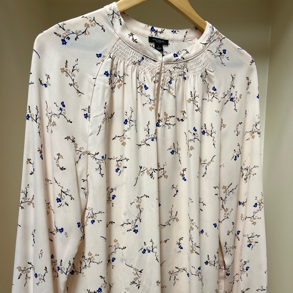 Blush colored with purple flowers Ann Taylor blouse. Size Large.